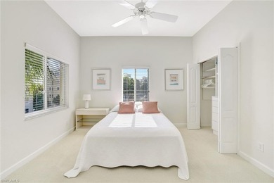 Enjoy elevated coastal living in this top-floor end unit at on Club at Pelican Bay Golf Course in Florida - for sale on GolfHomes.com, golf home, golf lot