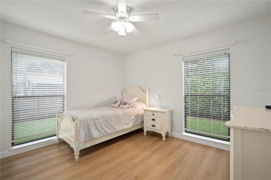 This beautifully maintained single-story home in Lake Padgett on Plantation Palms Golf Club in Florida - for sale on GolfHomes.com, golf home, golf lot