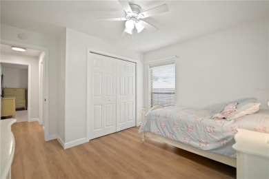 This beautifully maintained single-story home in Lake Padgett on Plantation Palms Golf Club in Florida - for sale on GolfHomes.com, golf home, golf lot