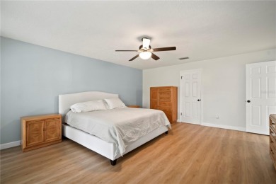 This beautifully maintained single-story home in Lake Padgett on Plantation Palms Golf Club in Florida - for sale on GolfHomes.com, golf home, golf lot