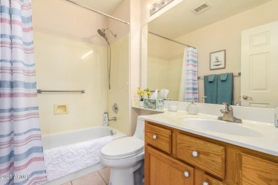 Fall in love with this spacious 3-bed, 2-bath gem featuring a on Coyote Lakes Golf Club in Arizona - for sale on GolfHomes.com, golf home, golf lot