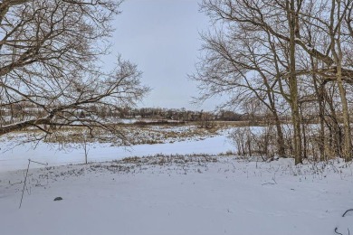 Nestled in a picturesque setting, this well-maintained home on Wild Marsh Golf Club in Minnesota - for sale on GolfHomes.com, golf home, golf lot