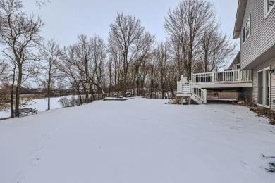 Nestled in a picturesque setting, this well-maintained home on Wild Marsh Golf Club in Minnesota - for sale on GolfHomes.com, golf home, golf lot