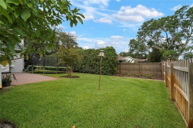 This beautifully maintained single-story home in Lake Padgett on Plantation Palms Golf Club in Florida - for sale on GolfHomes.com, golf home, golf lot