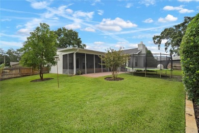 This beautifully maintained single-story home in Lake Padgett on Plantation Palms Golf Club in Florida - for sale on GolfHomes.com, golf home, golf lot