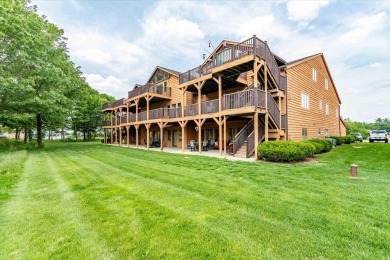 CASTLE ROCK LAKE RETREAT!! Spectacular Golf Course views are on Northern Bay Golf Resort and Marina in Wisconsin - for sale on GolfHomes.com, golf home, golf lot