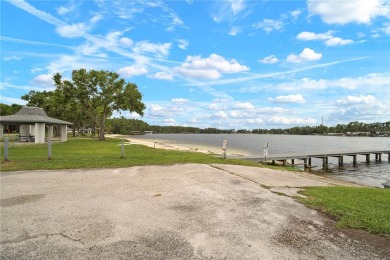 This beautifully maintained single-story home in Lake Padgett on Plantation Palms Golf Club in Florida - for sale on GolfHomes.com, golf home, golf lot