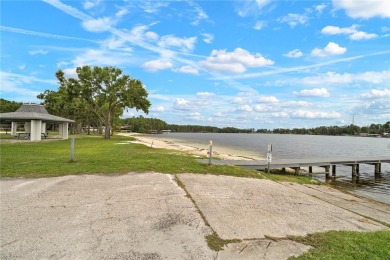 This beautifully maintained single-story home in Lake Padgett on Plantation Palms Golf Club in Florida - for sale on GolfHomes.com, golf home, golf lot