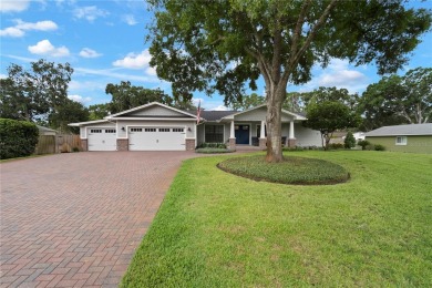 This beautifully maintained single-story home in Lake Padgett on Plantation Palms Golf Club in Florida - for sale on GolfHomes.com, golf home, golf lot