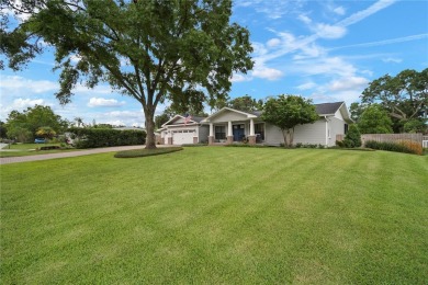 This beautifully maintained single-story home in Lake Padgett on Plantation Palms Golf Club in Florida - for sale on GolfHomes.com, golf home, golf lot
