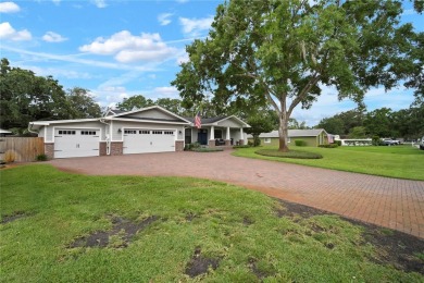 This beautifully maintained single-story home in Lake Padgett on Plantation Palms Golf Club in Florida - for sale on GolfHomes.com, golf home, golf lot