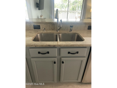 Bright & Fresh Condo with Golf & Pond Views | 2 BR, 2 BA Welcome on Members Club At St. James Plantation in North Carolina - for sale on GolfHomes.com, golf home, golf lot