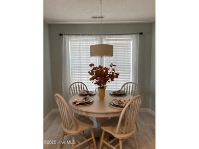 Bright & Fresh Condo with Golf & Pond Views | 2 BR, 2 BA Welcome on Members Club At St. James Plantation in North Carolina - for sale on GolfHomes.com, golf home, golf lot