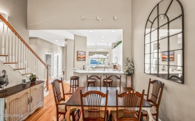 Unwind on your screened porch with front-row views of Davis on Ocean Creek Golf Course in South Carolina - for sale on GolfHomes.com, golf home, golf lot