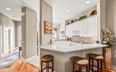Unwind on your screened porch with front-row views of Davis on Ocean Creek Golf Course in South Carolina - for sale on GolfHomes.com, golf home, golf lot