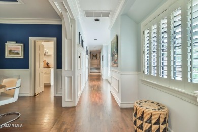 Nestled on a serene, tree-lined street in the prestigious on North Ranch Country Club in California - for sale on GolfHomes.com, golf home, golf lot