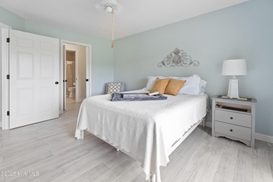 Bright & Fresh Condo with Golf & Pond Views | 2 BR, 2 BA Welcome on Members Club At St. James Plantation in North Carolina - for sale on GolfHomes.com, golf home, golf lot