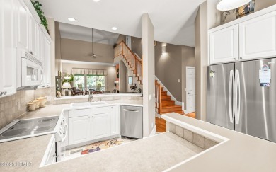 Unwind on your screened porch with front-row views of Davis on Ocean Creek Golf Course in South Carolina - for sale on GolfHomes.com, golf home, golf lot