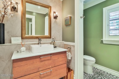 Nestled on a serene, tree-lined street in the prestigious on North Ranch Country Club in California - for sale on GolfHomes.com, golf home, golf lot