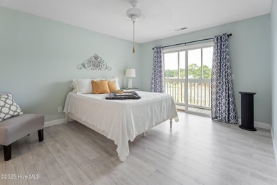 Bright & Fresh Condo with Golf & Pond Views | 2 BR, 2 BA Welcome on Members Club At St. James Plantation in North Carolina - for sale on GolfHomes.com, golf home, golf lot