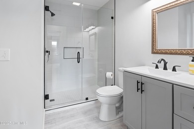 Bright & Fresh Condo with Golf & Pond Views | 2 BR, 2 BA Welcome on Members Club At St. James Plantation in North Carolina - for sale on GolfHomes.com, golf home, golf lot