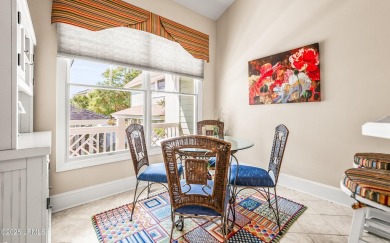 Unwind on your screened porch with front-row views of Davis on Ocean Creek Golf Course in South Carolina - for sale on GolfHomes.com, golf home, golf lot