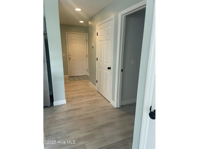 Bright & Fresh Condo with Golf & Pond Views | 2 BR, 2 BA Welcome on Members Club At St. James Plantation in North Carolina - for sale on GolfHomes.com, golf home, golf lot