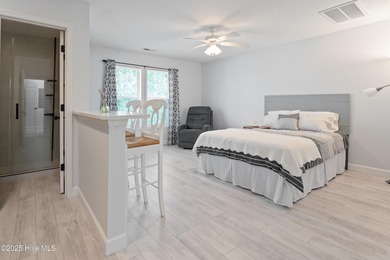 Bright & Fresh Condo with Golf & Pond Views | 2 BR, 2 BA Welcome on Members Club At St. James Plantation in North Carolina - for sale on GolfHomes.com, golf home, golf lot