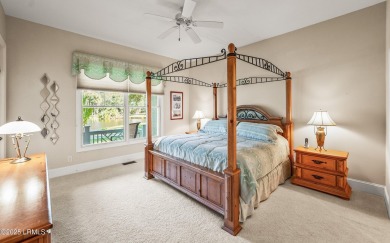 Unwind on your screened porch with front-row views of Davis on Ocean Creek Golf Course in South Carolina - for sale on GolfHomes.com, golf home, golf lot