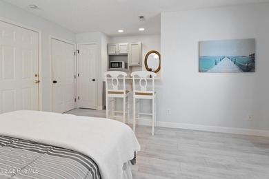 Bright & Fresh Condo with Golf & Pond Views | 2 BR, 2 BA Welcome on Members Club At St. James Plantation in North Carolina - for sale on GolfHomes.com, golf home, golf lot