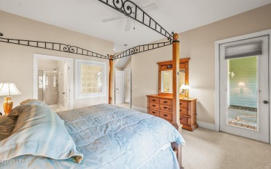 Unwind on your screened porch with front-row views of Davis on Ocean Creek Golf Course in South Carolina - for sale on GolfHomes.com, golf home, golf lot