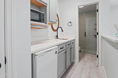 Bright & Fresh Condo with Golf & Pond Views | 2 BR, 2 BA Welcome on Members Club At St. James Plantation in North Carolina - for sale on GolfHomes.com, golf home, golf lot