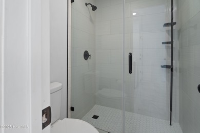 Bright & Fresh Condo with Golf & Pond Views | 2 BR, 2 BA Welcome on Members Club At St. James Plantation in North Carolina - for sale on GolfHomes.com, golf home, golf lot