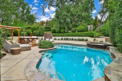 Nestled on a serene, tree-lined street in the prestigious on North Ranch Country Club in California - for sale on GolfHomes.com, golf home, golf lot