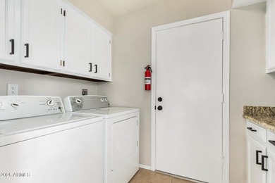 This beautifully refreshed 3-bedroom home in Leisure World, is on Coyote Run Golf Course in Arizona - for sale on GolfHomes.com, golf home, golf lot