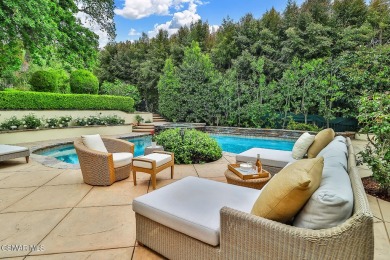 Nestled on a serene, tree-lined street in the prestigious on North Ranch Country Club in California - for sale on GolfHomes.com, golf home, golf lot