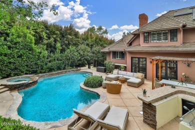 Nestled on a serene, tree-lined street in the prestigious on North Ranch Country Club in California - for sale on GolfHomes.com, golf home, golf lot