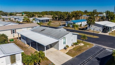 Beautifully maintained and fully furnished 2-bedroom, 2-bath on Kings Gate Golf Club in Florida - for sale on GolfHomes.com, golf home, golf lot