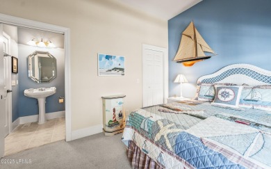 Unwind on your screened porch with front-row views of Davis on Ocean Creek Golf Course in South Carolina - for sale on GolfHomes.com, golf home, golf lot