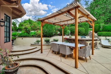 Nestled on a serene, tree-lined street in the prestigious on North Ranch Country Club in California - for sale on GolfHomes.com, golf home, golf lot