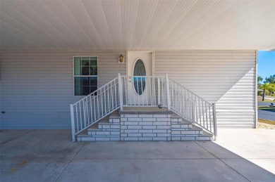 Beautifully maintained and fully furnished 2-bedroom, 2-bath on Kings Gate Golf Club in Florida - for sale on GolfHomes.com, golf home, golf lot