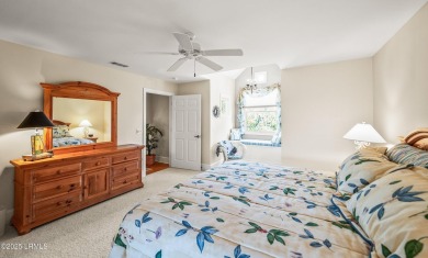 Unwind on your screened porch with front-row views of Davis on Ocean Creek Golf Course in South Carolina - for sale on GolfHomes.com, golf home, golf lot