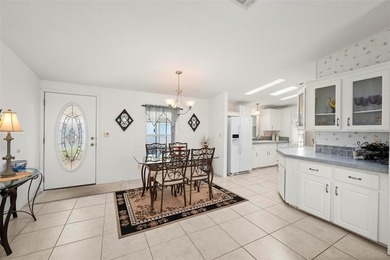 Beautifully maintained and fully furnished 2-bedroom, 2-bath on Kings Gate Golf Club in Florida - for sale on GolfHomes.com, golf home, golf lot