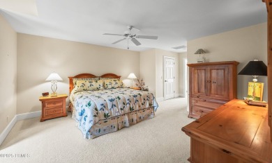 Unwind on your screened porch with front-row views of Davis on Ocean Creek Golf Course in South Carolina - for sale on GolfHomes.com, golf home, golf lot