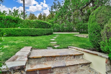 Nestled on a serene, tree-lined street in the prestigious on North Ranch Country Club in California - for sale on GolfHomes.com, golf home, golf lot