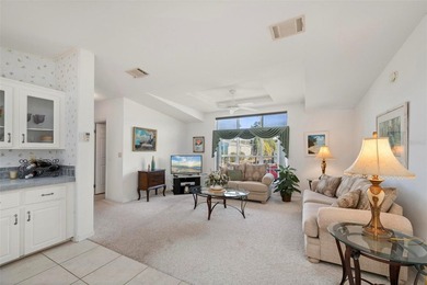 Beautifully maintained and fully furnished 2-bedroom, 2-bath on Kings Gate Golf Club in Florida - for sale on GolfHomes.com, golf home, golf lot