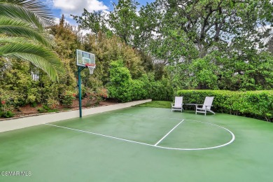 Nestled on a serene, tree-lined street in the prestigious on North Ranch Country Club in California - for sale on GolfHomes.com, golf home, golf lot