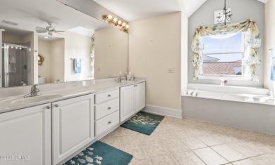 Unwind on your screened porch with front-row views of Davis on Ocean Creek Golf Course in South Carolina - for sale on GolfHomes.com, golf home, golf lot