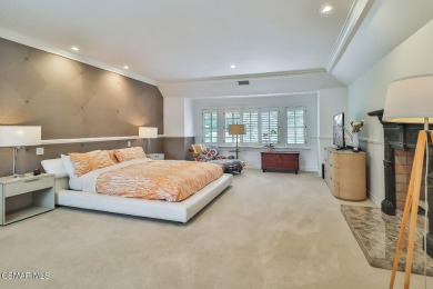 Nestled on a serene, tree-lined street in the prestigious on North Ranch Country Club in California - for sale on GolfHomes.com, golf home, golf lot