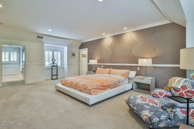Nestled on a serene, tree-lined street in the prestigious on North Ranch Country Club in California - for sale on GolfHomes.com, golf home, golf lot